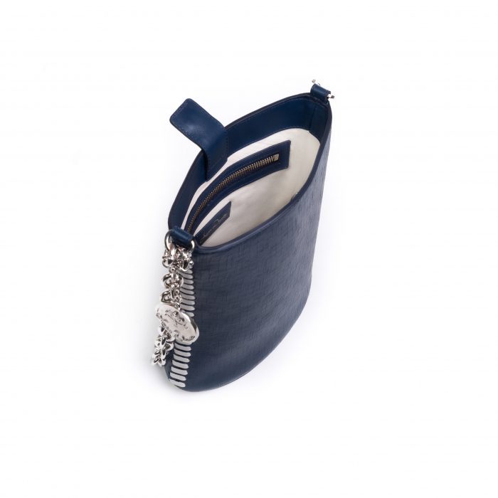 A blue purse with a silver chain on the side.