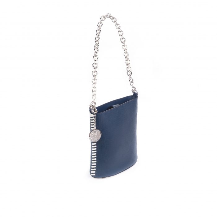 A blue purse with silver chain handle and white accents.