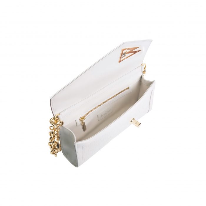 A white purse with gold chain handles and a long strap.