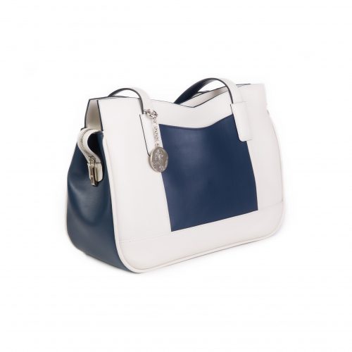 A blue and white purse with a key charm.