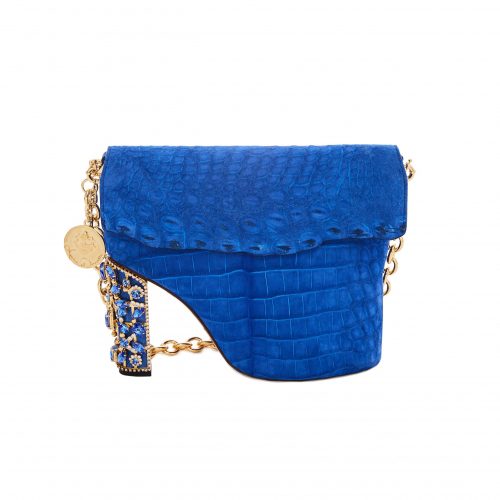 A blue purse with a chain strap and a gold metal tag.