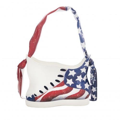 A white purse with an american flag design on it.