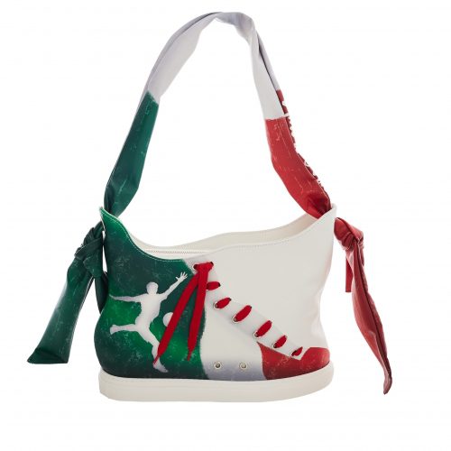 A white bag with red, green and white laces.