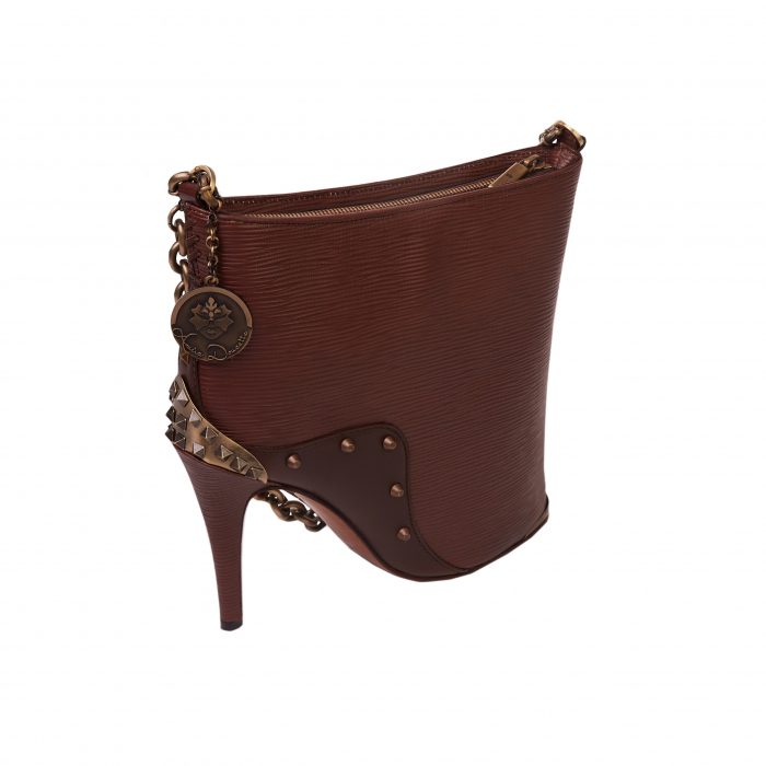 A brown purse with a high heel shoe on it.