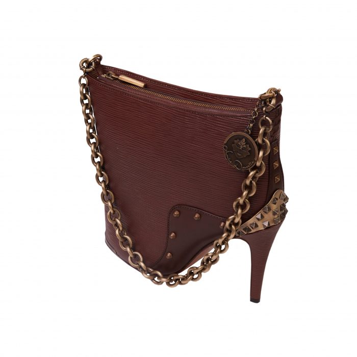 A brown purse with gold chain and heels.